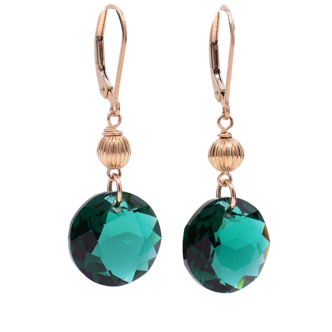 These crystal earrings feature emerald green round Swarovski crystals with gold filled leverback clips.