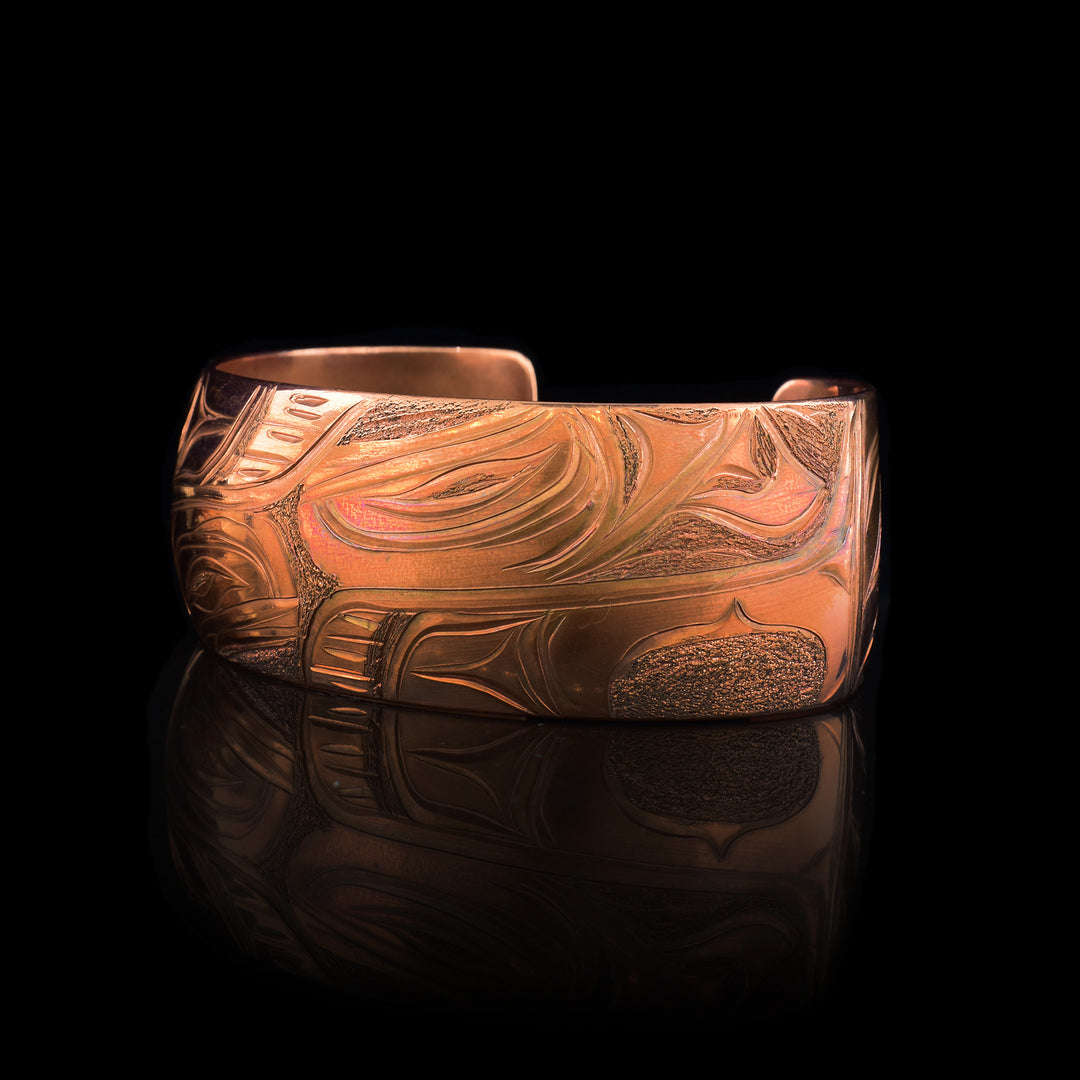 1" Copper Orca Cuff has been hand carved with the legend of the orca.