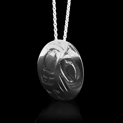 This sterling silver pendant holds the shape of the Eagle.  It measures 2" x 1/2".