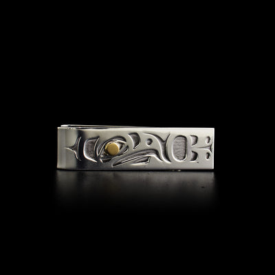 This sterling silver money clip has the shape of the Eagle. The Eagle has a gold eye.