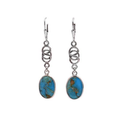 These dangle earrings have oval shaped turqoise hangs.