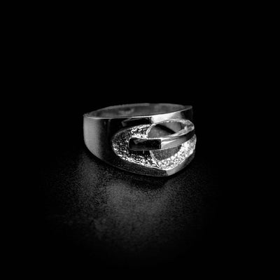 One-of-a-kind smooth and textured ring with buckle-like design on front. By Michel de Bellefeuille.