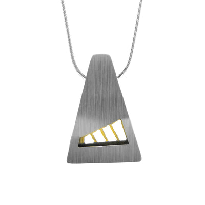 Domed, silver-colour pendant with triangle shape and flat top. Close to bottom a piece is cut out with slanted, vertical gold-colour lines going across.