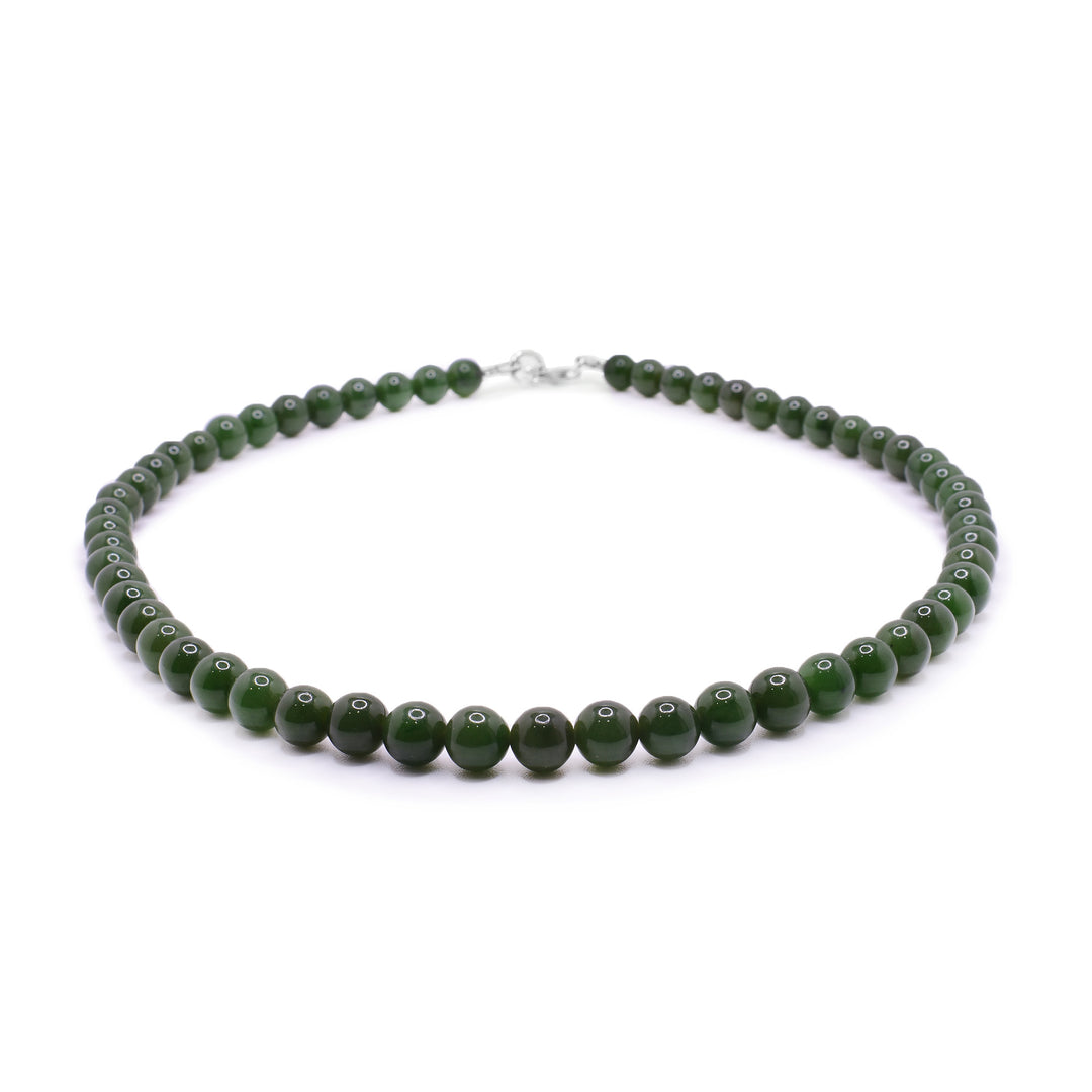 Classic Green Jade Bead Necklace the dainty beads have a sterling silver clasp at the back.