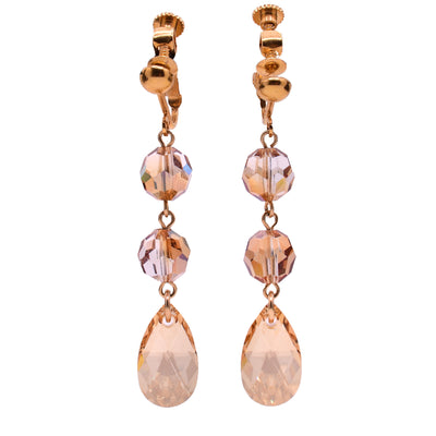 Drop clip earrings made of Austrian crystal. Gold-plated brass clips. By Honica.
