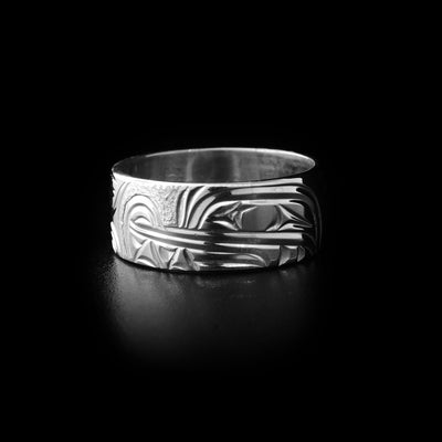 Sterling silver ring with hand-carved wolf head and background designs. By Kwakwaka’wakw artist Cristiano Bruno.