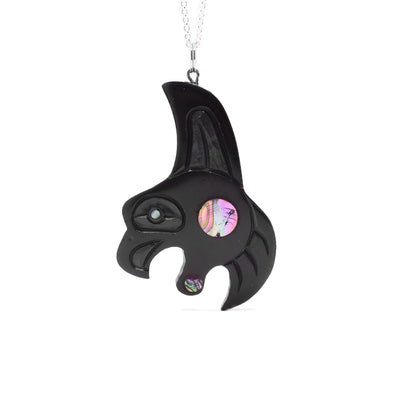 Argillite eagle in flight pendant with circular abalone accents. Hand-carved by Haida artist Amy Edgars.
