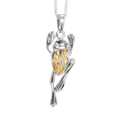 Sterling silver frog pendant with 22K gold nuggets on back. Sterling silver bail. By Tom Gregorczyk.