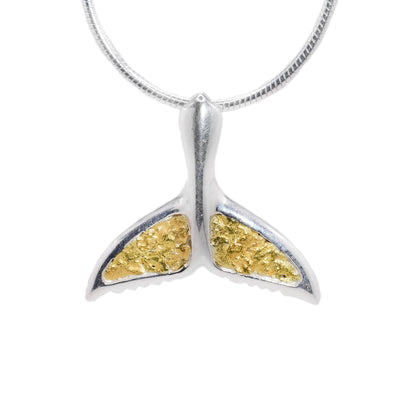 Sterling silver whale tail pendant with 22K gold nuggets in the fins. Handcrafted by Tom Gregorczyk.