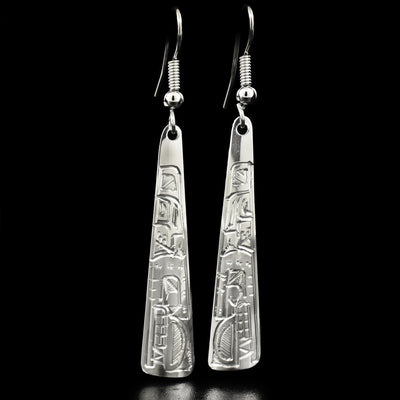 These stunning earrings have the face of the Bear facing downwards handcarved on them. They are made of sterling silver and are triangular in shape.