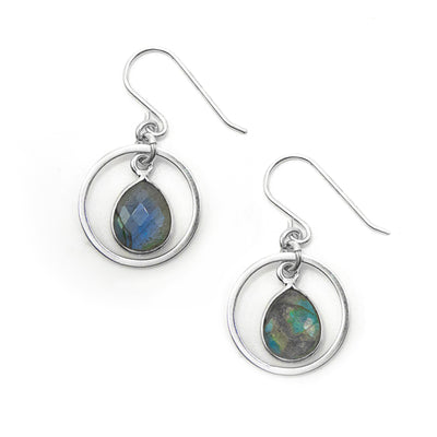 Dangle hoop earrings with flat, faceted labradorite teardrops dangling in hoops. Metal is sterling silver.
