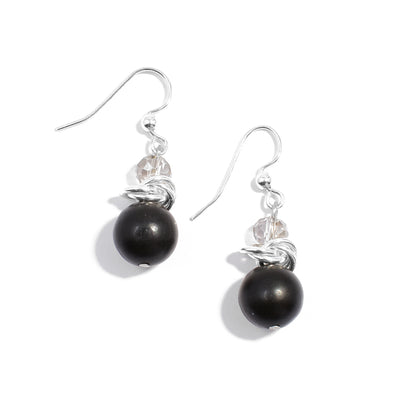 Sterling silver matte black agate earrings with interlocking hoops adornments and light grey translucent beads.