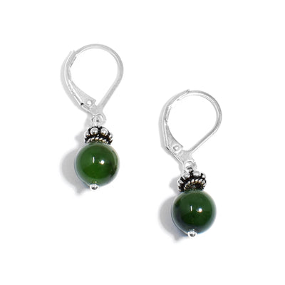 For each earring, there is a round BC jade bead with an oxidized silver adornment above. Lever-back hooks. Made using sterling silver.
