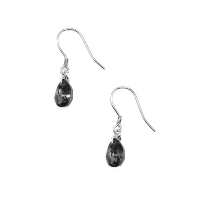 Teardrop Silver Night colour Swarovski crystals dangle from hooks. All metal is sterling silver. Each earring measures 1” x 0.25” including hook.