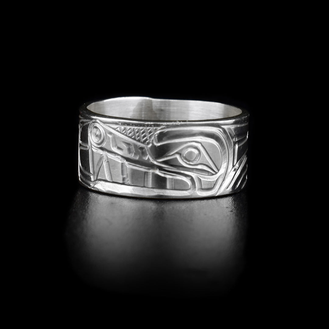 This Wolf ring is made from sterling silver and has a chunky, single band with the Wolf carved into it.