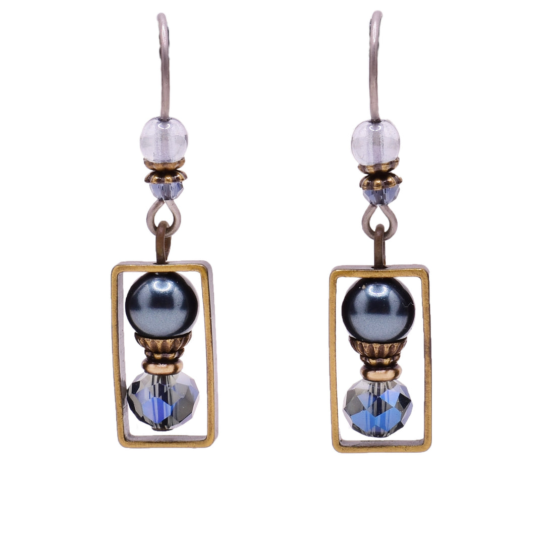 Blue dangle earrings made of Austrian crystal, hematine and glass. Titanium ear hooks. By Honica.