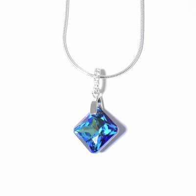 Princess-cut Bermuda Blue Swarovski Crystal. Bail is encrusted with a line of cubic zirconia.