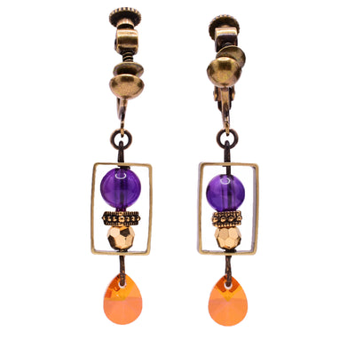 Dangle clip earrings made of gold-plated Austrian crystal, Austrian crystal, and amethyst. Brass ear clips. By Honica.