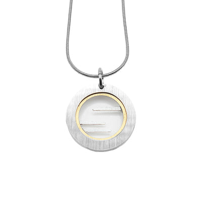 Circle pendant necklace made of brushed and anodized aluminum. Abstract design. Stainless steel snake chain included. By JR Franco.