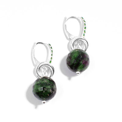 Sterling silver ruby in zoisite dangle earrings with interlocking hoops adornments resting on top. Lever-back hooks are adorned with green cubic zirconia.