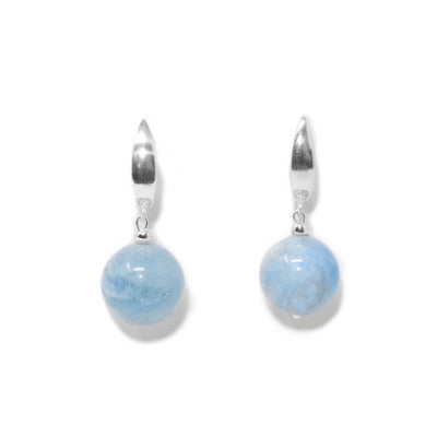Round aquamarine beads, 0.5” in diameter, hang from sterling silver lever-back hooks.