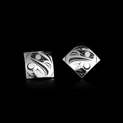 For both earrings, there is a side-view of an eagle’s head and outstretched wing. By Tahltan artist Grant Pauls.