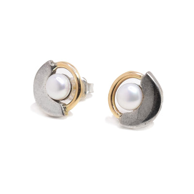 Sterling silver and 14K yellow gold white freshwater mabé pearl studs handcrafted by Ivan Dobren.