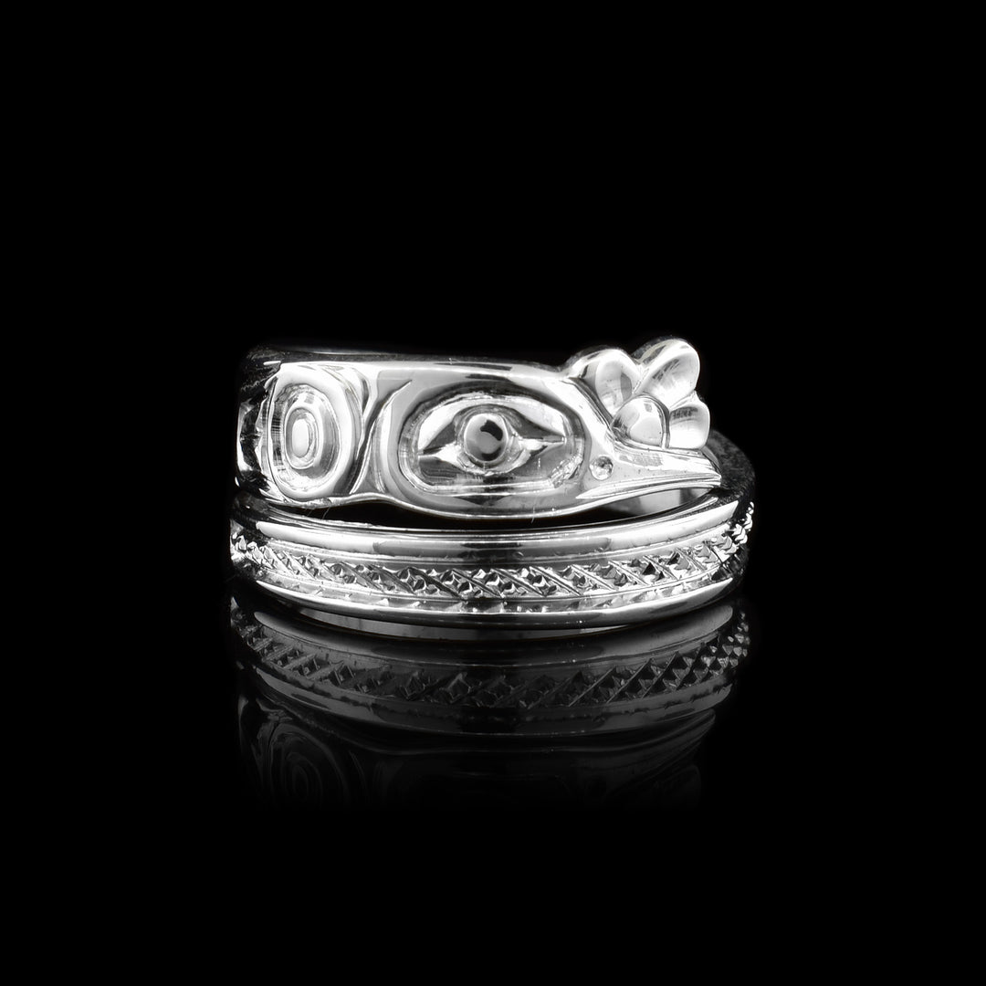 Silver Hummingbird Wrap Ring, delicately carved with detail of the hummingbird starting with a flower were the hummingbird drinks and wraps around.