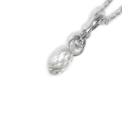 Teardrop smoke Swarovski crystal hangs below interconnected sterling silver ring adornments leading up to bail. Pendant measures 1.5” x 0.5” including bail.