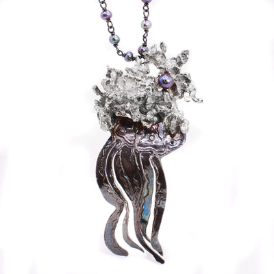 Abstract sterling silver jellyfish pendant with purple-blue pearls. By Johanne Rousseau.