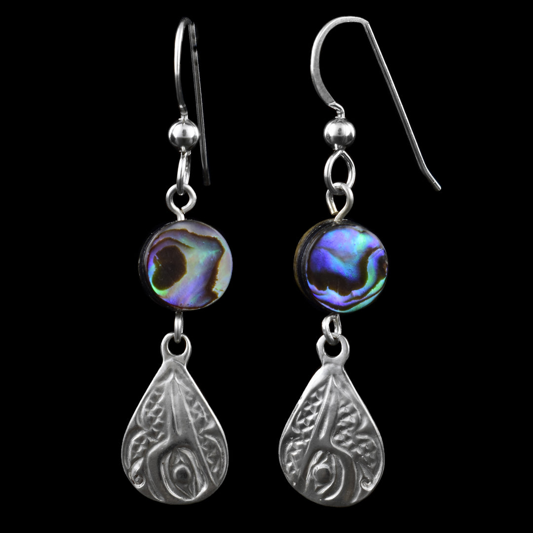 These elegant teardrop hummingbird earrings feature a finely detailed hummingbird design carved in sterling silver. Above each teardrop is a small circular abalone shell, with colours of blue, green, and purple that catch the light beautifully. finished with simple French hooks.