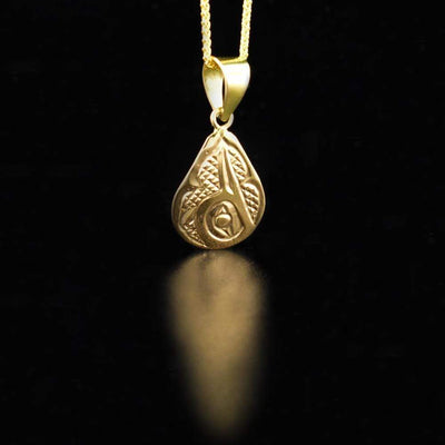 14K Gold Teardrop Hummingbird Pendant is hand carved by artist Carrie Matilpi