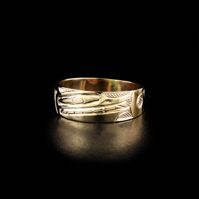 Gold wolf ring hand-carved by Indigenous artist Ivan Thomas. Made of 14K gold. Width of band is 0.31". Size 10.