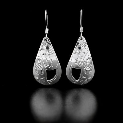 Sterling Silver Teardrop Eagle Earrings by Harold Alfred. The design depicts the head of an eagle with a wing in each earring.