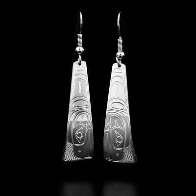 These eagle earrings are triangle shaped and both have the profile of an eagle's head with a large feather facing downwards.