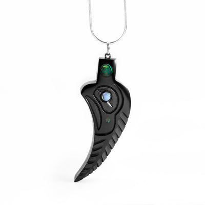 Argillite Feather Pendant (facing the left) hand carved by Haida artist, Amy Edgars.