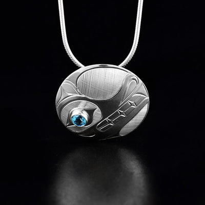 Sterling Silver Round Wolf Pendant with Blue Topaz