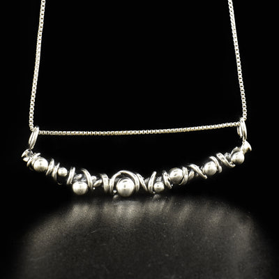 Sterling Silver Bud and Vine Necklace is handcrafted by Joy Annett.