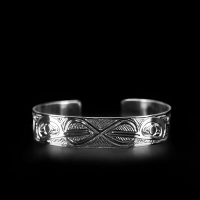 Sterling Silver 1/2" Double Hummingbird Infinity Bracelet hand-carved by Kwakwaka'wakw artist Carrie Matipli.