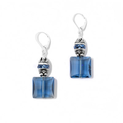 These Square Denim Blue Swarovski Crystal Earrings are hand-crafted by artist Karley Smith. She has used sterling silver and Swarovski Crystal to create them.  Each earring measures 1.75" x 0.56" including the hook.