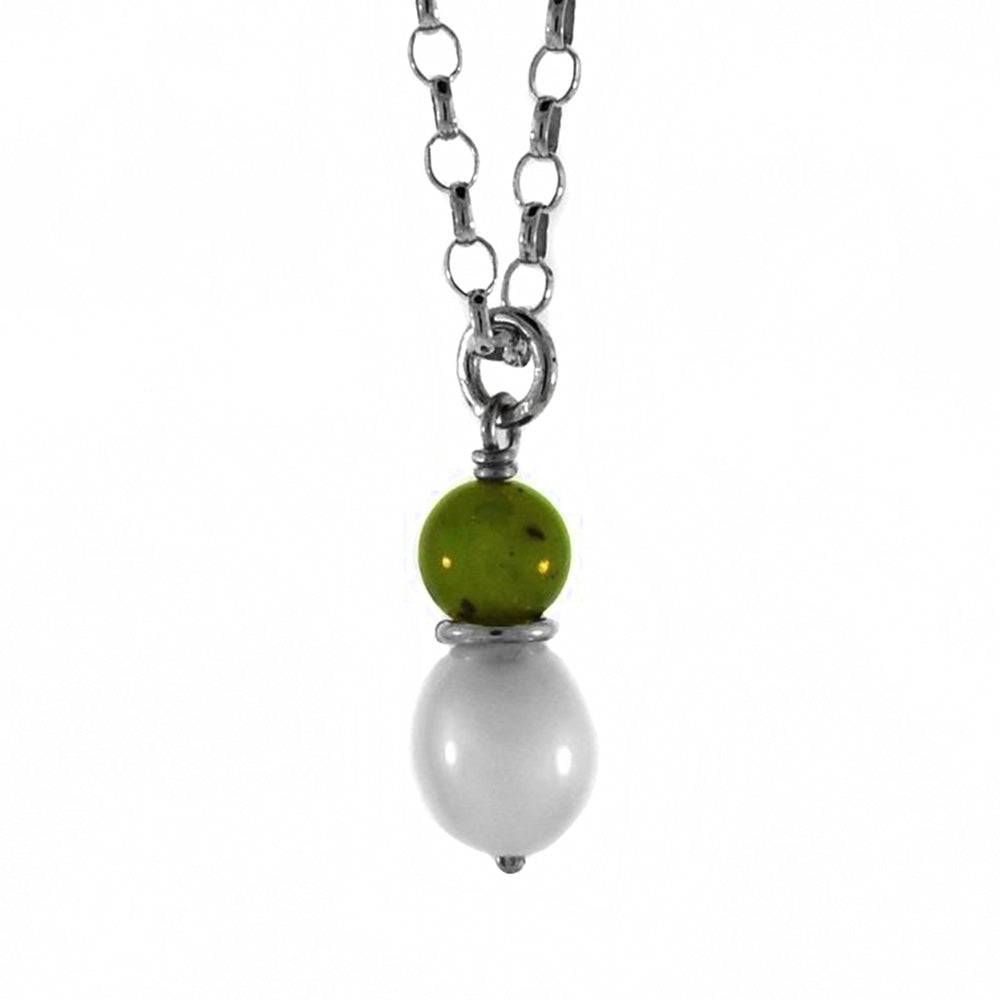 This delicate pendant was created by BC artist Karley Smith. The BC Jade bead rests atop a silver ring above a white freshwater pearl. The pendant is 0.75" (2cm) tall and the chain is 22″ long.