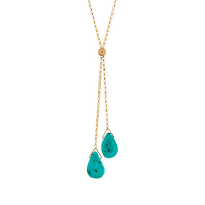 This Gold Fill Turquoise Lantern Lariat Necklace is hand crafted by artist Pamela Lauz. The necklace is made using 14k gold-filled chain and genuine turquoise.  The necklace is 17" long and the lariat drops down an additional 2.25".