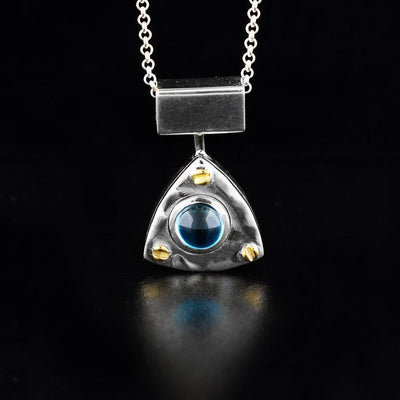 Sterling Silver and 14K Gold Blue Topaz Pendant