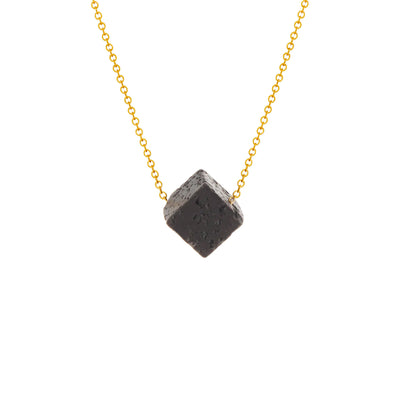 Gold Fill Element Lava Rock Cube Slide Necklace by artist Pamela Lauz. She has used a cubed lava rock bead and a 14K gold-filled chain to create this delicate minimalist piece. The bead measures 0.39" x 0.39" x 0.39" and the adjustable chain can be 16" or 18" long.