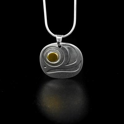 Large salmon egg pendant by Tahltan artist Grant Pauls. Made of sterling silver and 18K gold. Pendant measures 0.45" x 0.40" including bail. Chain not included.
