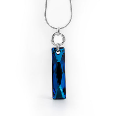 Large Queen's Baguette Crystal Pendant handcrafted by artist Debra Nelson. Made of sterling silver and Bermuda Blue Swarovski Crystal. Pendant measures 2" x 0.38" including bail. Chain not included.