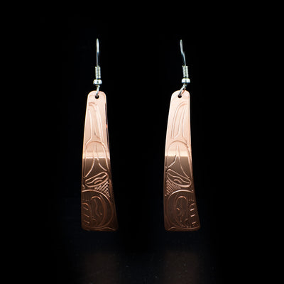 Long Copper Orca Earrings hand-carved by Kwakwaka'wakw artist John Lancaster. They are made of copper and have sterling silver ear hooks. Each earring measures 2.55" x 0.50" including hook.