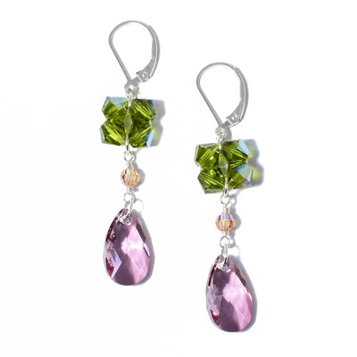 Colourful lever back earrings handcrafted by artist Debra Nelson. Made of sterling silver and Swarovski Crystal. Each earring measures 2" x 0.38" including hook.