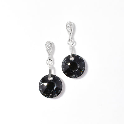 Swarovski crystal dangle stud earrings handcrafted by artist Debra Nelson. Made of charcoal Swarovski crystal, sterling silver and cubic zirconia. Each earring measures 1.19" x 0.50".