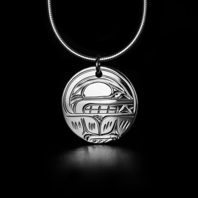 Round Sterling Silver Orca Pendant hand-carved by Kwakwaka'wakw artist Victoria Harper. Pendant measures approximately 0.80" x 0.70" including bail. Chain not included.